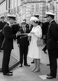 College Prints: Queen Elizabeth II and Prince Andrew admire a commemorative Worcester plate presented to