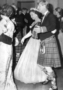 Queen Elizabeth II and Prince Philip dancing a Reel at a Royal Ball in Scotland