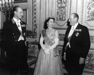 00083 Prints: Queen Elizabeth II and Prince Philip with King Olav of Norway pictured after the dinner