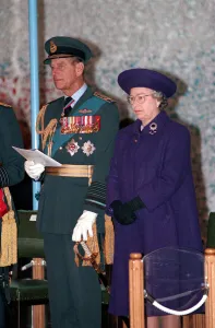 Queen Elizabeth II and Prince Philip presenting colours at RAF Marham. April 1994