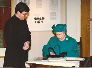 Queen Elizabeth II and Prince Philip visit the North East 18 May 1993 - The Queen signing