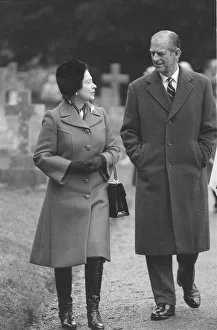 Elizabeth Ii Prints: Queen Elizabeth II and Prince Philip walking through Sandringham. February 1986
