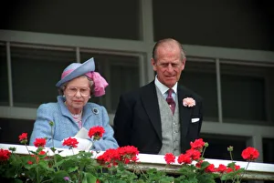 01440 Prints: Queen Elizabeth II and Prince Philip watching the Derby horse race. June 1991