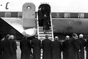 00476 Prints: Queen Elizabeth II, Princess Elizabeth steps from her plane at London Airport after being