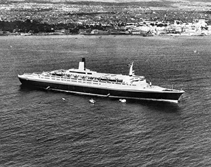The Queen Elizabeth II - QE2 ship - seen here of the coast of Barbados
