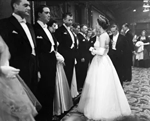 Queen Elizabeth II seen here attending a film premiere of Beau Brammell at the Empire