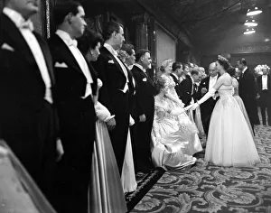 Queen Elizabeth II seen here attending a film premiere of Beau Brammell at the Empire