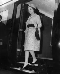 Queen Elizabeth II steps off the Royal Train at Bryn Station. 17th May 1968