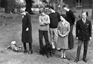 Queen Elizabeth II takes a stroll in the grounds of Balmoral Castle with Prince Philip