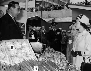 Stalls Prints: Queen Elizabeth II talks to Mr J Hand at his vegetable stall at the Bull Ring