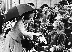 Queen Elizabeth II on a visit to Essex receives a model of Prince Charles