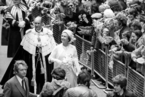 Queen Elizabeth II waving at the crowd during their Silver Jubilee celebrations