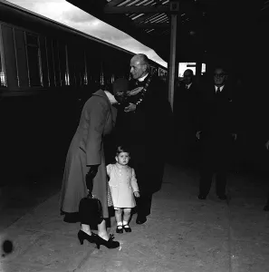 Queen Elizabeth with Prince Charles on arrival at station in Scotland, September 1950