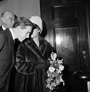 Bouquet Prints: Queen Elizabeth, The Queen Mother, and Princess Margaret attend a gala charity matinee of