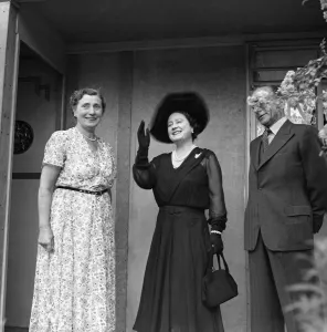 01061 Prints: Queen Elizabeth The Queen Mother visits the garden of Mrs Lena Atkinson in Streatham