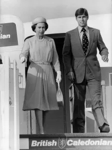 Queen Elizabeth with her son Prince Andrew on aircraft steps Circa 1980