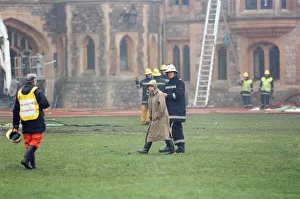 Fireman Prints: The Queen is escorted by the chief fire officer around the grounds of Windsor Castle as