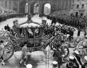 Coronation Prints: The Queen in the Gold State Coach passing through Trafalgar Square on her return