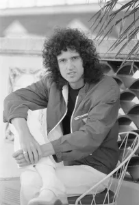 00086 Prints: Queen guitarist Brian May seen here relaxing in a roof top garden in New Orleans, USA