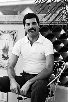Queen lead singer Freddie Mercury seen here relaxing in a roof top garden in New Orleans