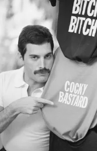 Queen lead singer Freddie Mercury seen here out shopping in a street market in New