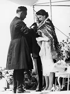 Australasia Prints: The Queen has a Maori cloak placed around her shoulders by the bishop of Aotearoa in