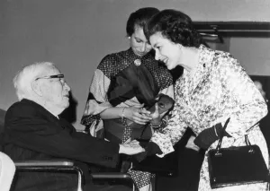 Shaking Hands Prints: The Queen meets Charlie Chaplin at the opening of the British academy of film