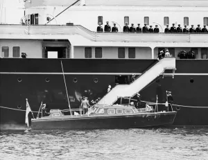 The Queen meets her children at Tobruk, Libya on board Britannia after 158 days apart