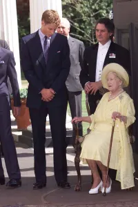 Prince Prints: Queen Mother 99th Birthday August 1999 Prince William bends down to talk