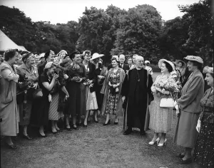 The Queen Mother in the gardens of Lambeth Palace 1955 with the Archbishop of