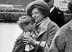 Grandson Prints: Queen Mother greets her grandson Prince Edward at the tiny Scottish port of Scrabster