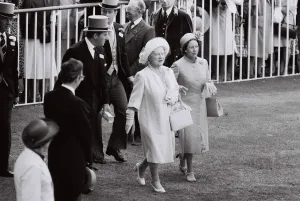 The Queen Mother June 1980 And Princess Margaret walking down the race course
