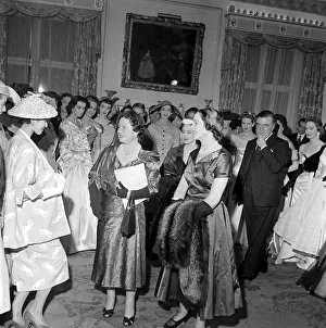 The Queen Mother and Princess Margaret seen here at the Salon of clothes designer Hardy