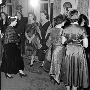 The Queen Mother and Princess Margaret seen here at the Salon of clothes designer Hardy