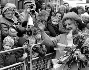 Warwick Prints: The Queen Mother, well wrapped up against the cold, earned a warm welcome from crowds as