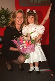 Pob1999 Prints: Queen Noor and Emily Casey heart op girl May 1999 at the Mirror Pride of Britain