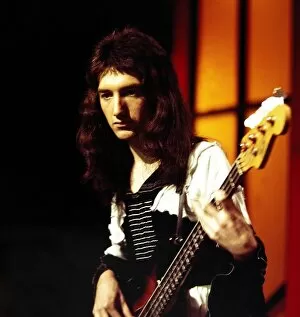 00185 Collection: Queen - Pop Group. John Deacon seen here in rehearsals at the White City studios of Top