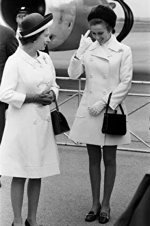 The Queen and Princess Anne waiting to board the plane for a 10 day visit to Canada