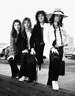 Long Prints: Queen Rock Pop Group - left to right John Deacon Roger Taylor Brian May & Freddie