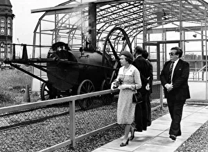 The Queen sees the working replica of Trevithicks Penydarren locomotive with curator