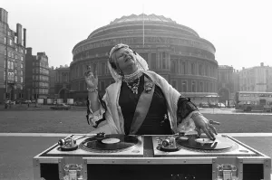 Necklace Prints: A Queen Victoria lookalike DJ-ing outside the Royal Albert Hall 9th March 1987