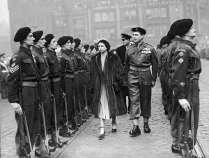 The Queen visits Manchester. Princess Elzabeth conducts an inspection of the guard in