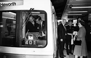 Images Dated 6th November 1981: The Queen waits while Prince Philip, Duke of Edinburgh takes in a Metro tram driving