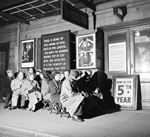 Waiting Prints: Queue of poeple waiting to see the Mousetrap, now in its 5th year December 1957