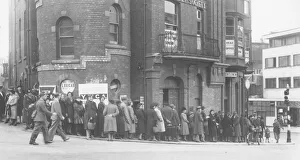 Rationing Prints: Queuing for fish at the top of Union Street opposite the Town Hall in April 1943 Torquay