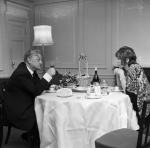 01028 Prints: Quintin Hogg MP in conversation with film star Shirley MacLaine at the Savoy Hotel