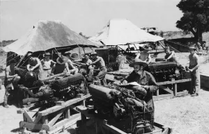 Repairing Prints: R. A. F fitters at work reconditioning Merlin engines for spitfires at an R. A