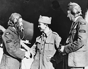 Greeting Prints: The R. A. F In Greece. A British handshake for a Greek Soldier at an aerodrome in