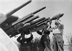 Armoury Prints: R. A. F ground crew equipping Typhoons with rocket projectiles at a landing strip in France