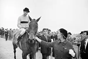 Racehorse owner The Duchess of Westminster leads smiling jockey Pat Taaffe on racehorse